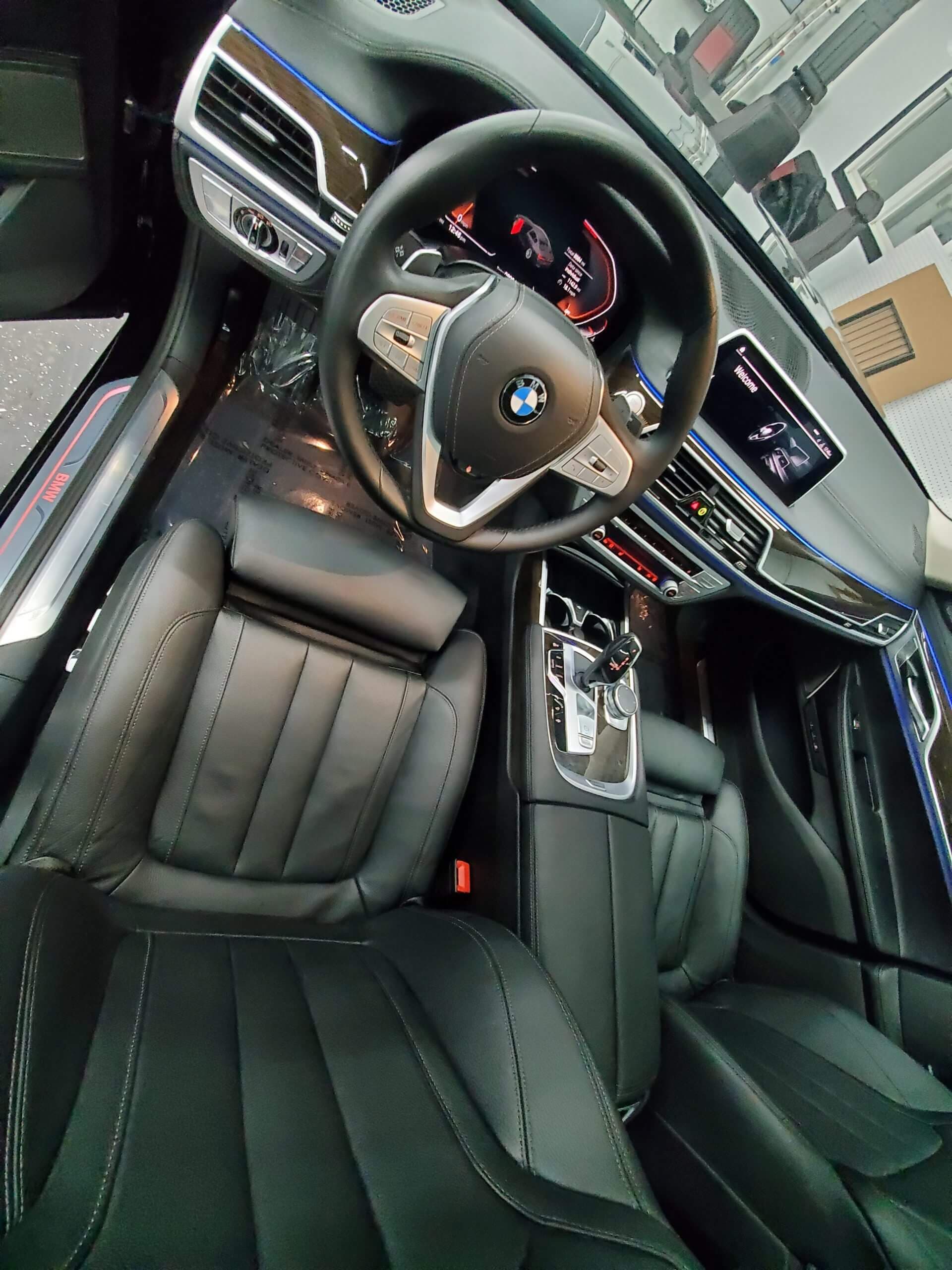 BMW interior showing front leather seat after repair and conditioning